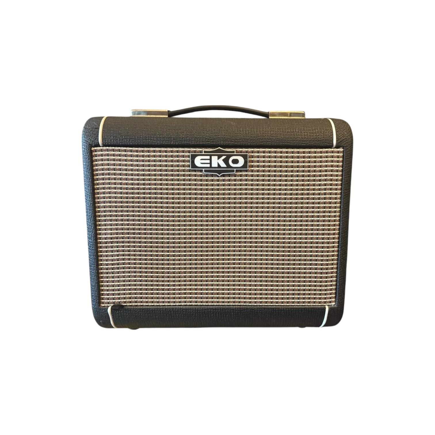 Eko AC60 Amplificatore per Chitarra Acustica 60W USATO 1 Amplificatore acustico EKO AC60 con griglia frontale marrone e logo EKO in alto.